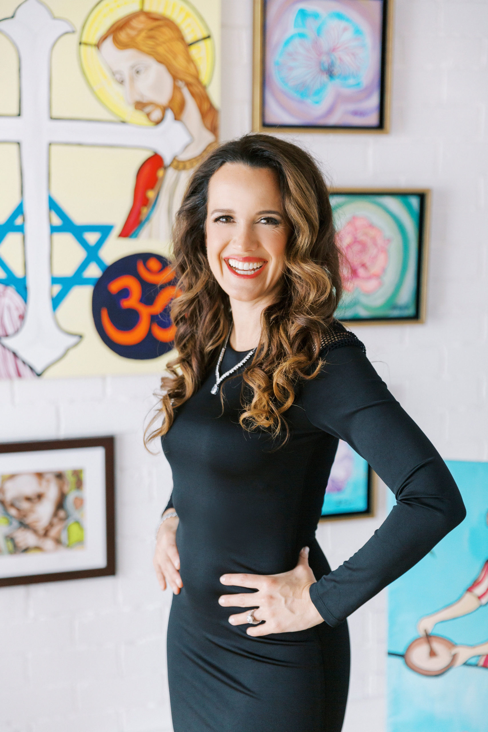 HT Art closer up Heather with paintings in background